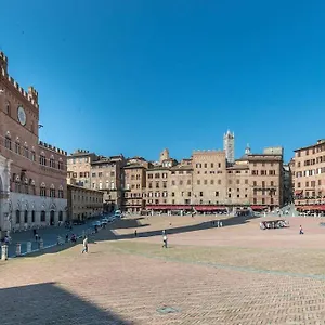 https://mimosa-loft-elegante-con-terrazza-nel-centro-di-siena.it-tuscanyhotel.com